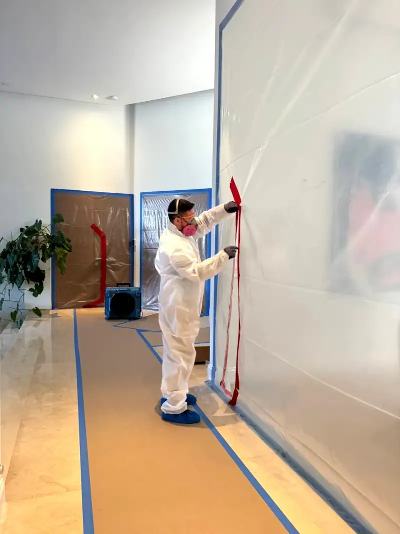 24/7 Service Pros technicians working on water damage restoration in Hallandale Beach, FL